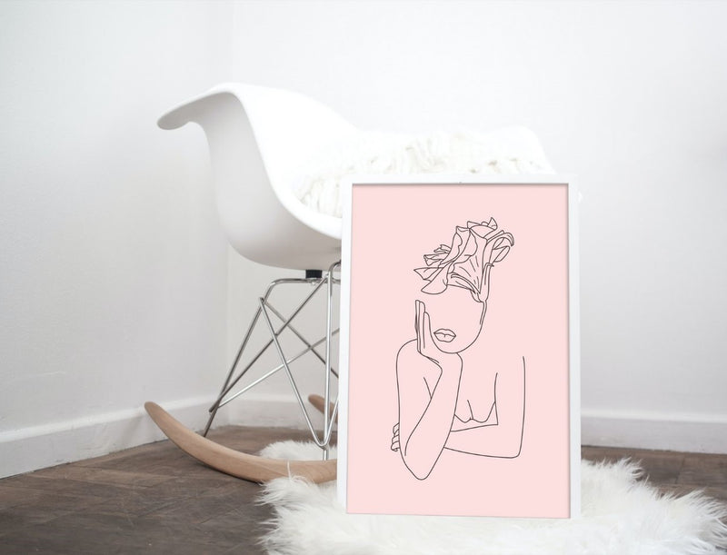 Line art poster, black lines on pink background. In living room setting